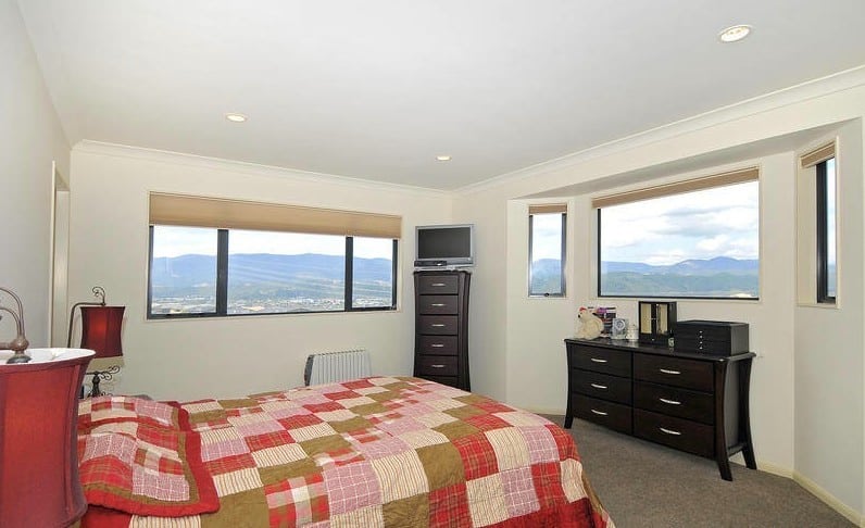 clean master bedroom with view and plenty of light