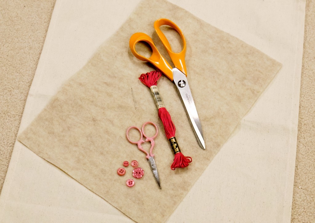 Child holds the scissors and cut out the felt flower. Scissors, hot glue  gun, sheets of felt, decorative pendant with felt butterflies and flowers  Stock Photo by ©OnlyZoia 115559608