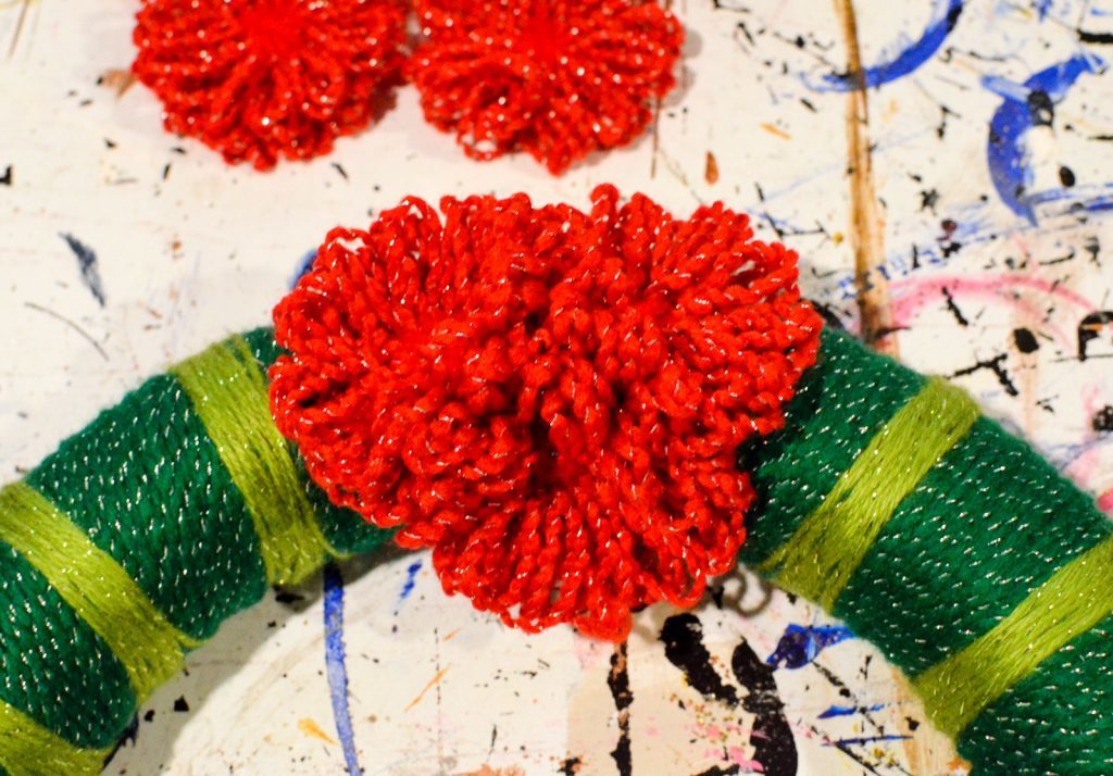 attach yarn flowers