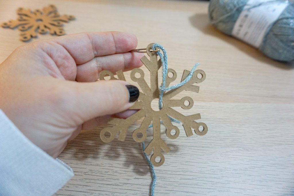 Yarn-Laced Snowflake Ornament