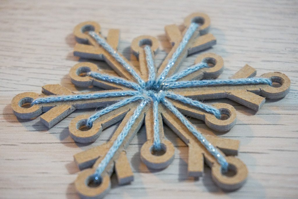 Yarn-Laced Snowflake Ornament